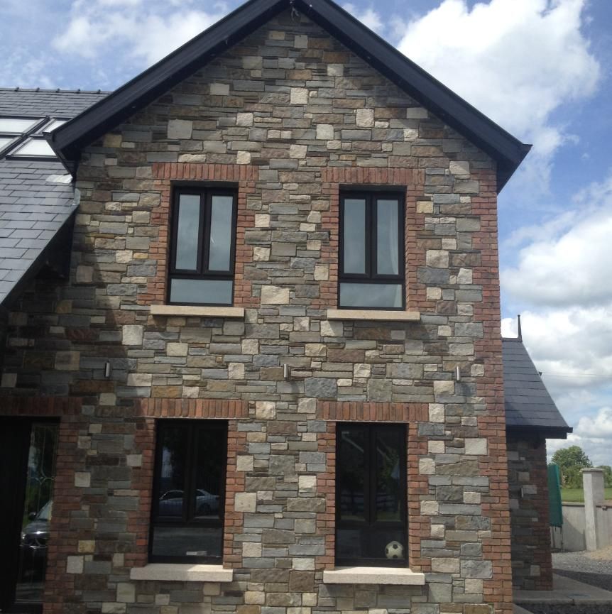 Grey, brown and cream sandstone mixed