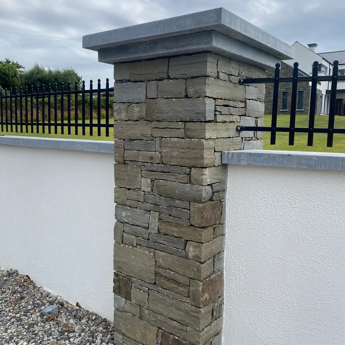 Irish sanded double pier cap finishing a grey sandstone pier