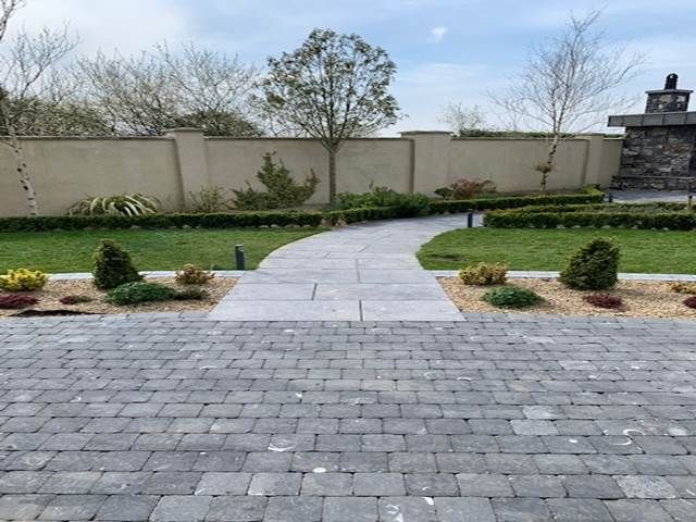 Kilkenny tumbled paving in conjunction with flamed paving pathway