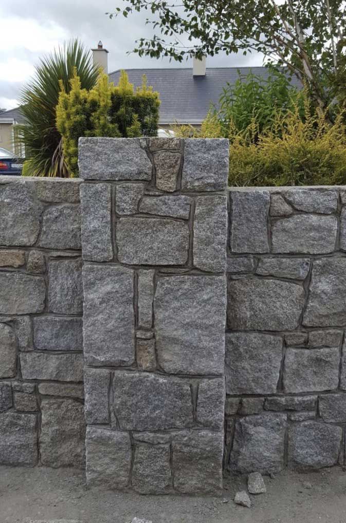 Grey granite with large hand dressed corners