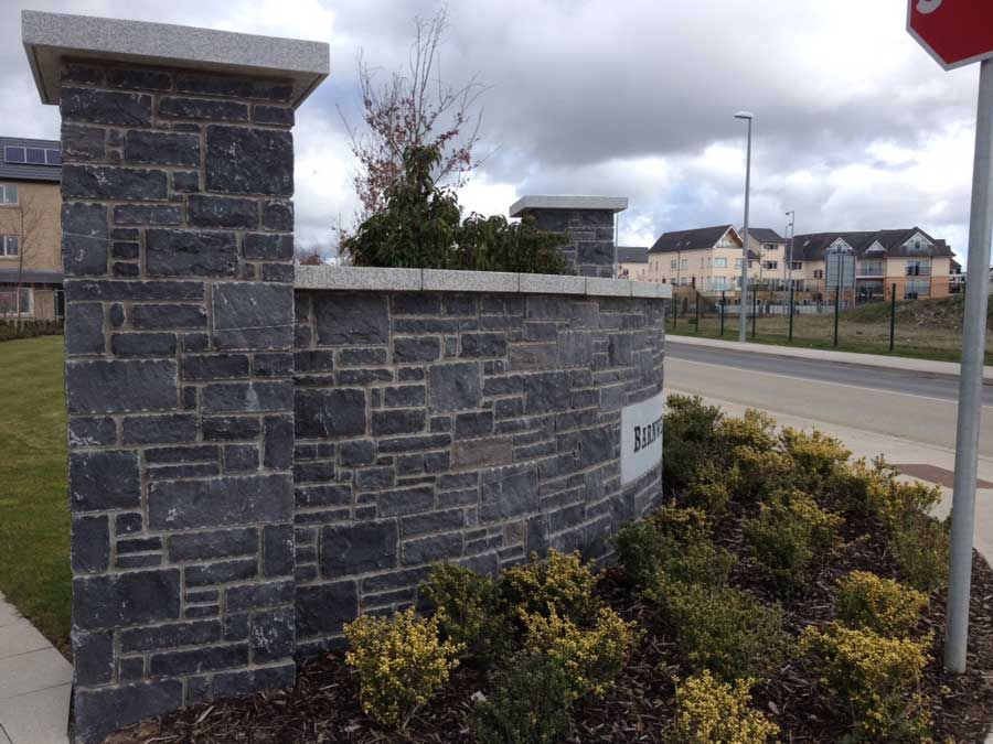 Dressed modular limestone with granite capping