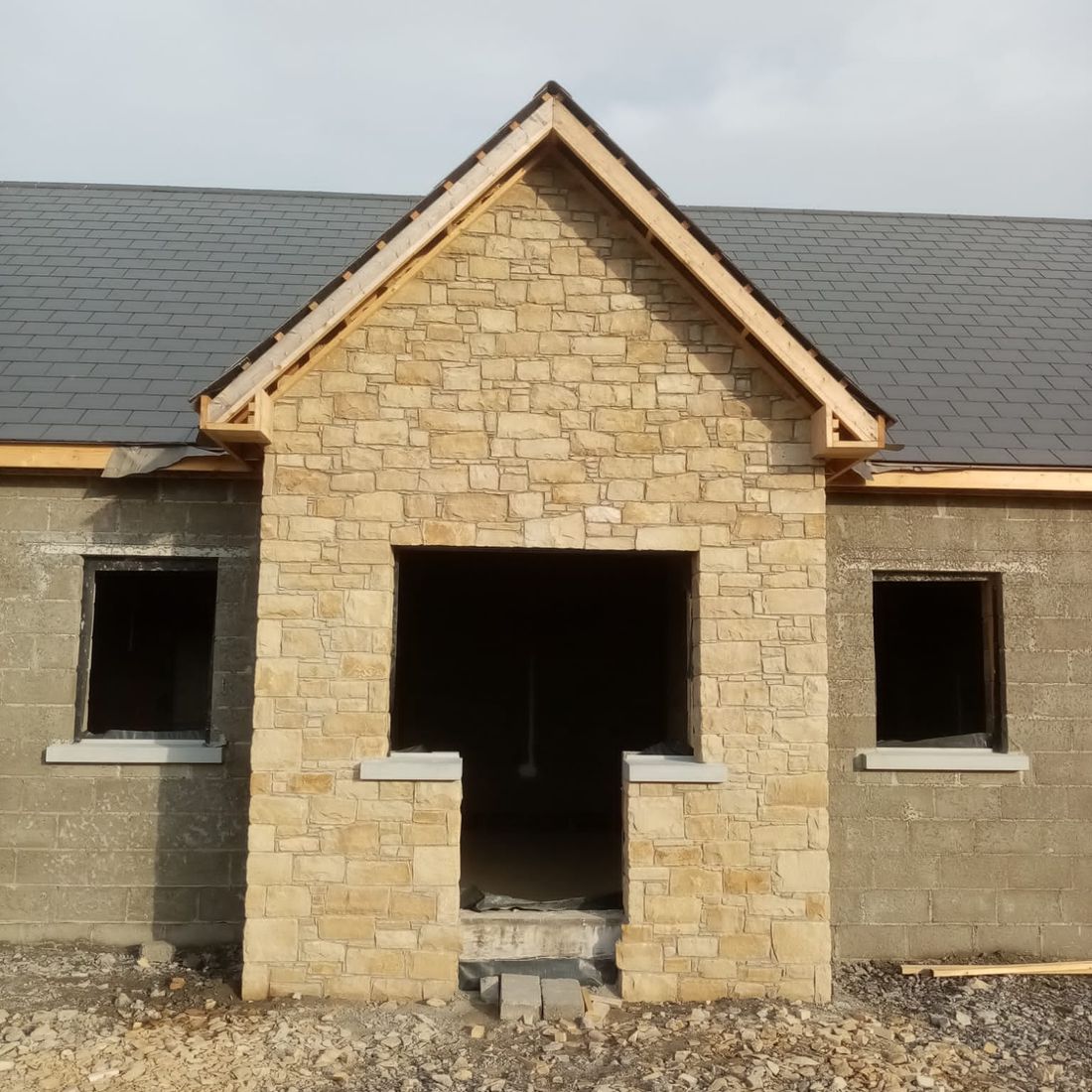 Cream sandstone porch laid using a traditional dry joint