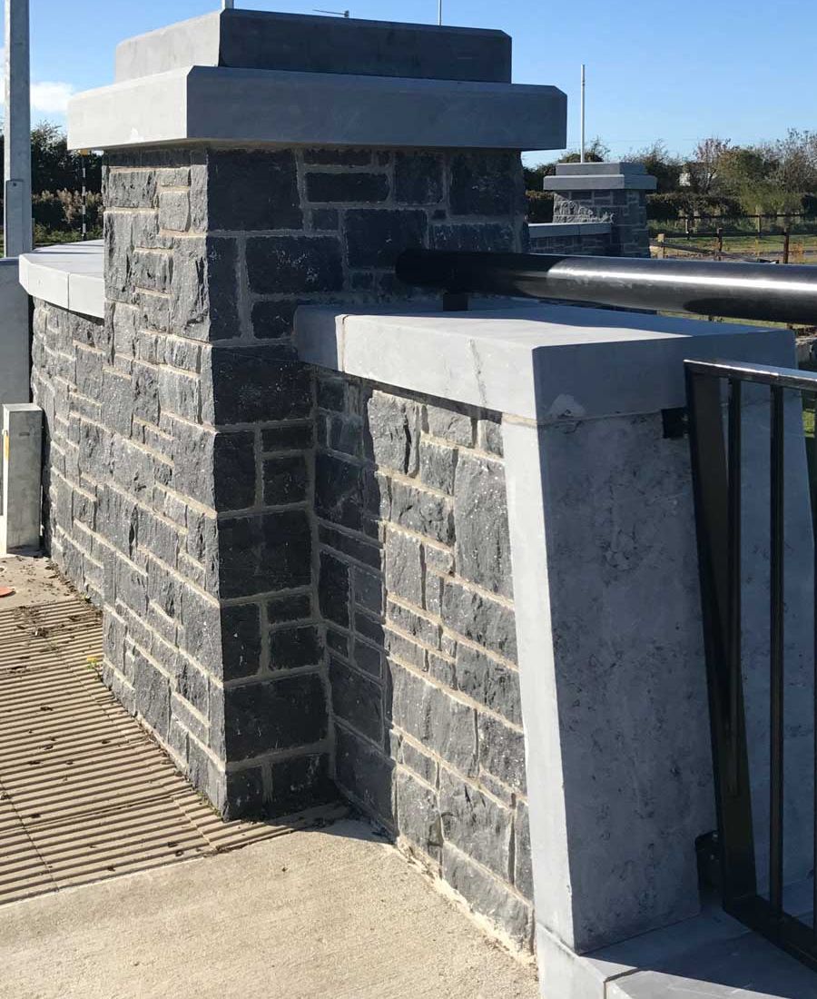 Sanded limestone wall capping complimenting modular blue limestone building stone