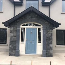 Cut regular limestone limestone enhanced with blue limestone door surround 
