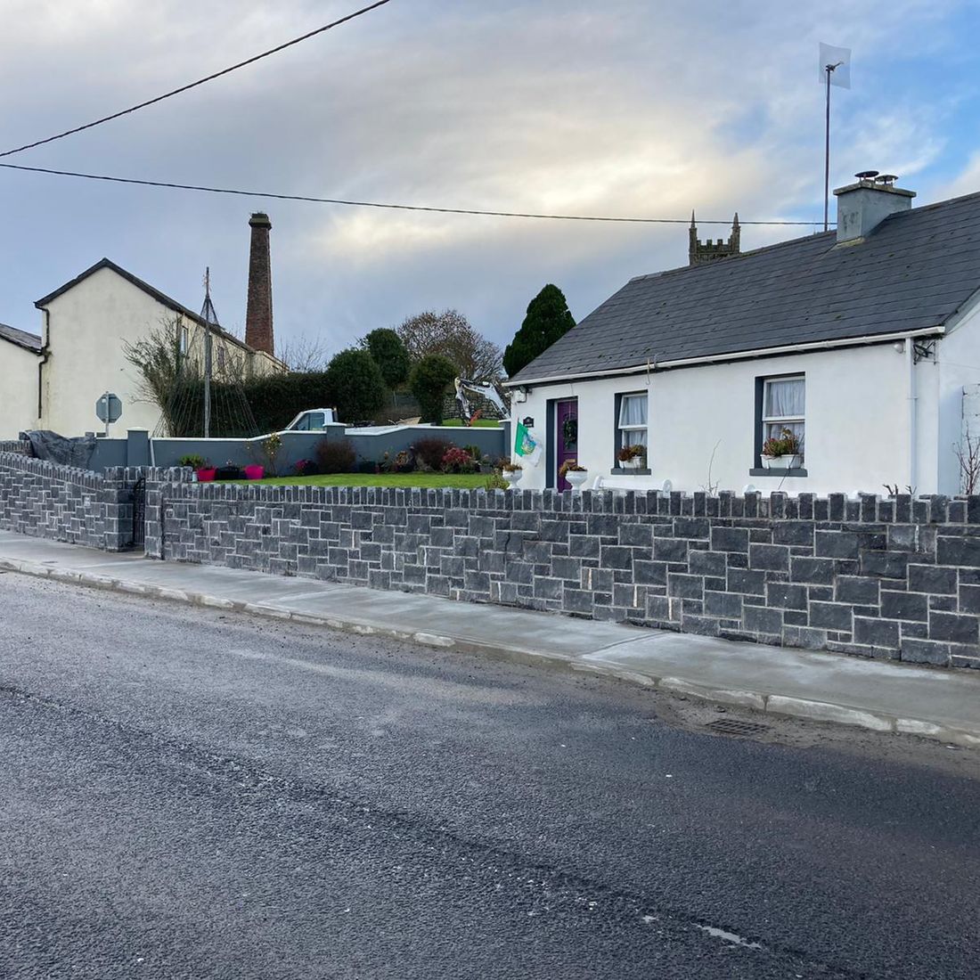 Modular cut limestone with traditional cock & hen capping 