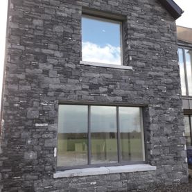 Modular cut limestone enhanced with Irish limestone window cills