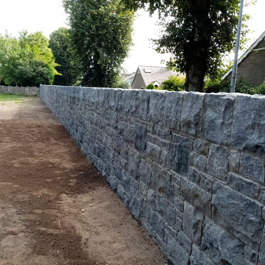 Cut regular limestone enhanced with large soldier coarse capping 