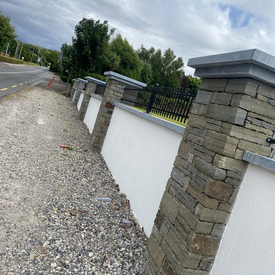 Sanded limestone wall & pier caps 