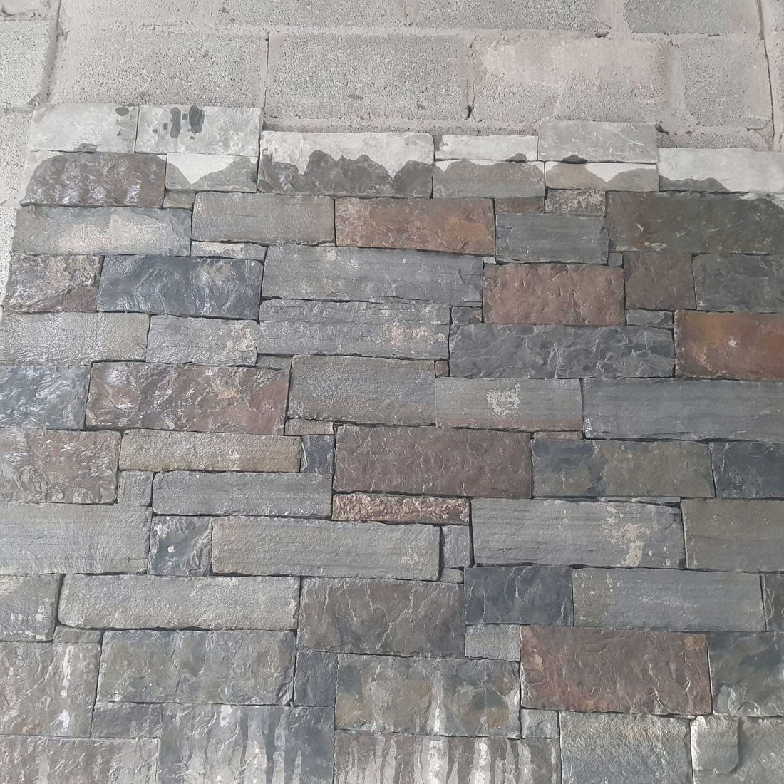 Grey sandstone thin wall cladding with various natural shades & tones 