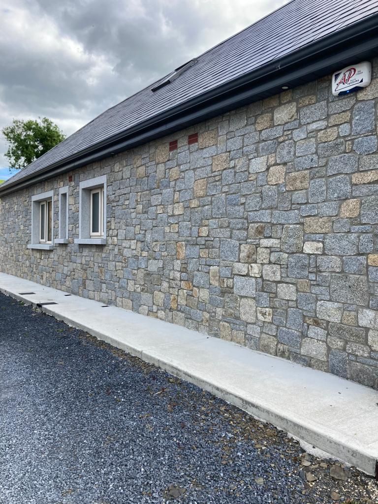 Grey granite enhanced with a variety of cream & brown shades 