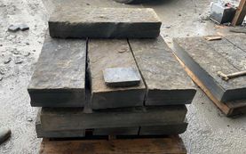 Rustic grey/brown sandstone steps ready for dispatch