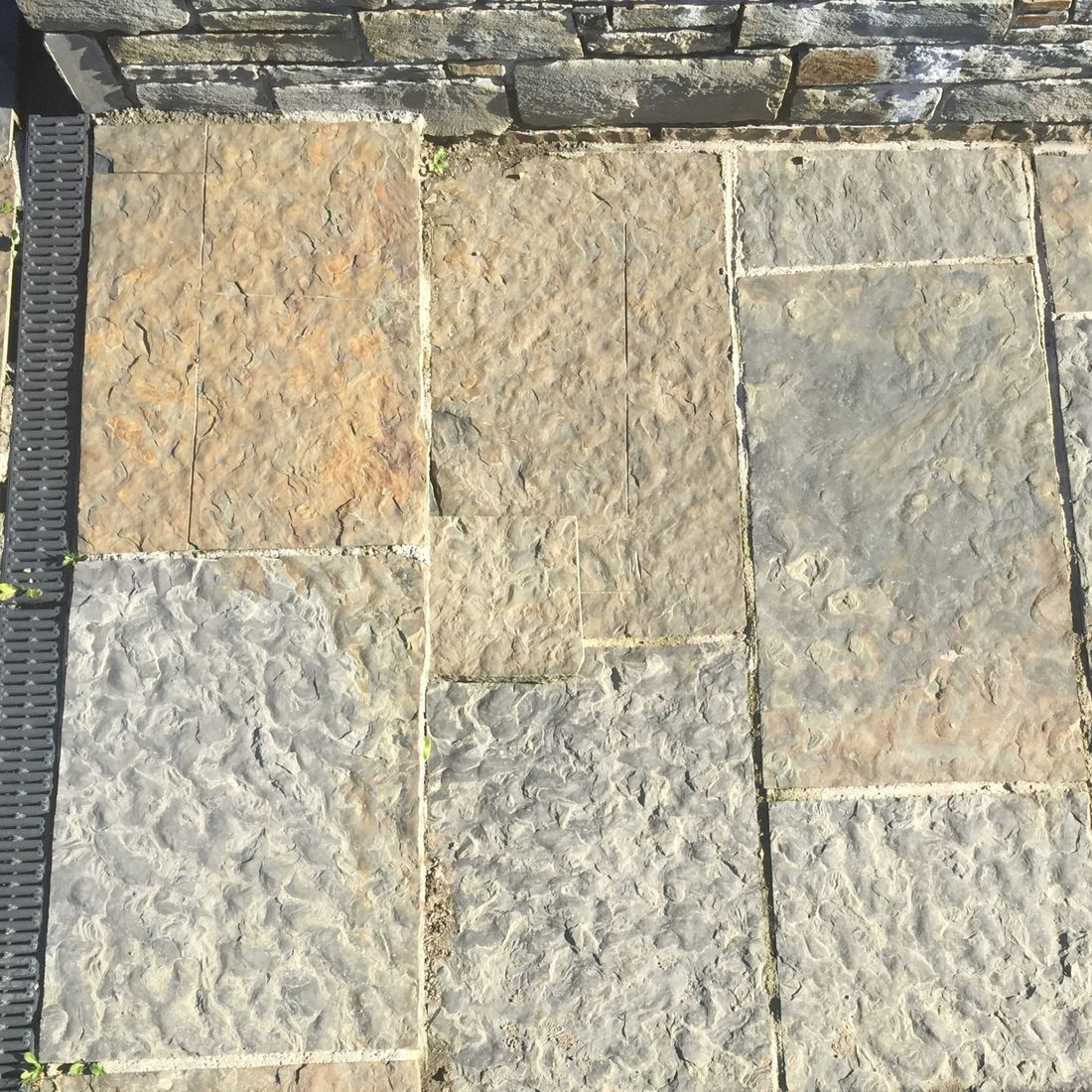 Cut regular grey brown sandstone