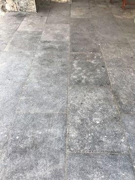 Kilkenny flamed paving featuring some natural fossil