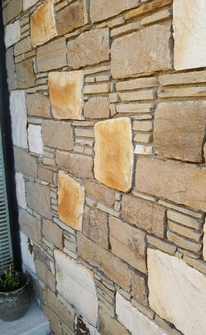 Split building stone mixed with levellers