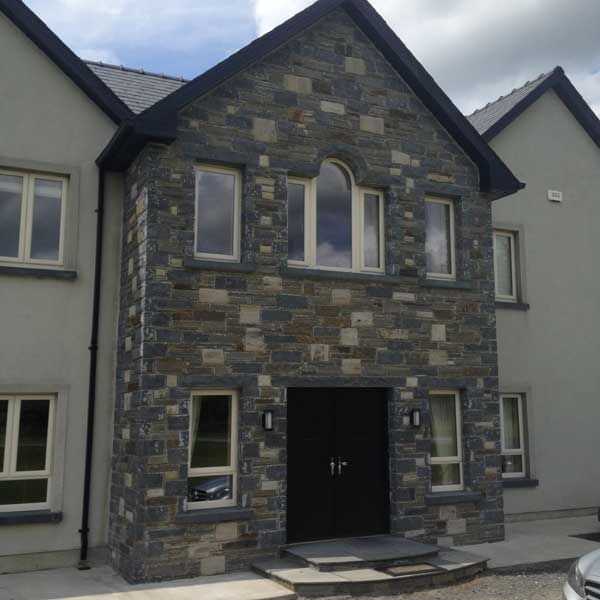 Limestone, grey & white with rock face arch