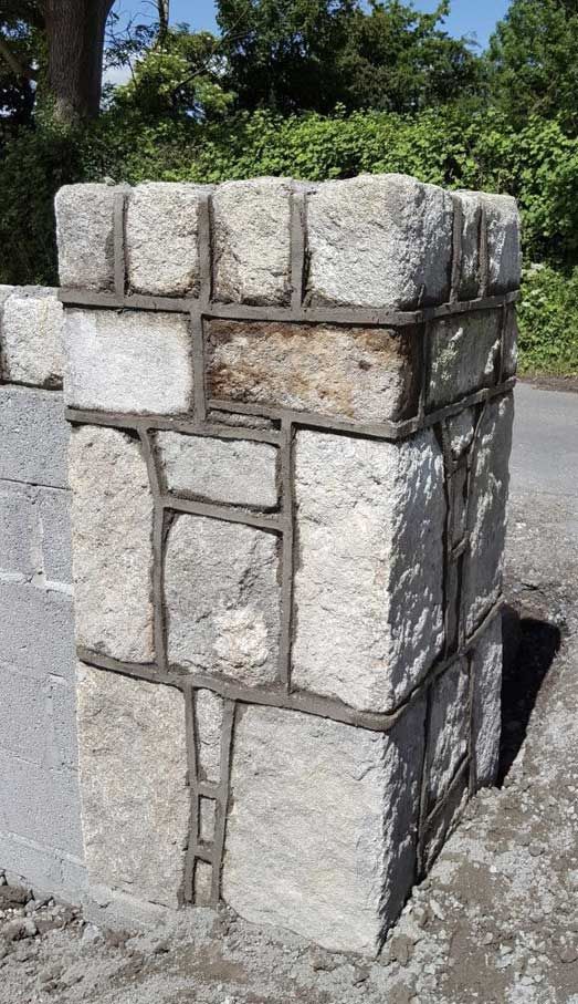 Dressed brown granite with large corner stones