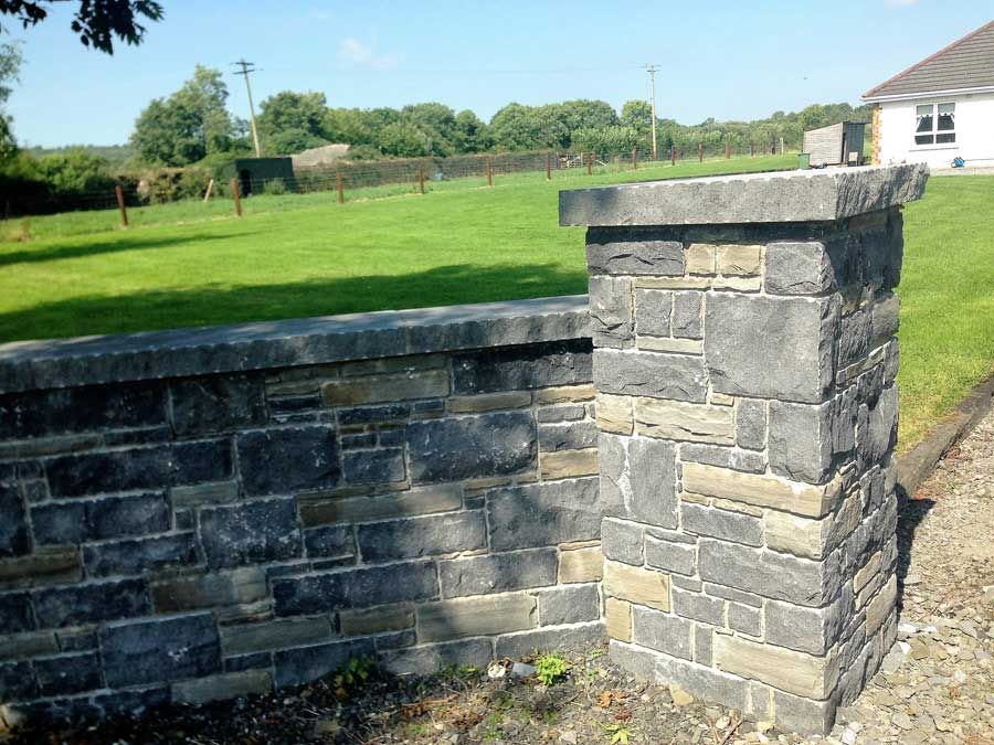 Dressed corner stones blended with grey sandstone