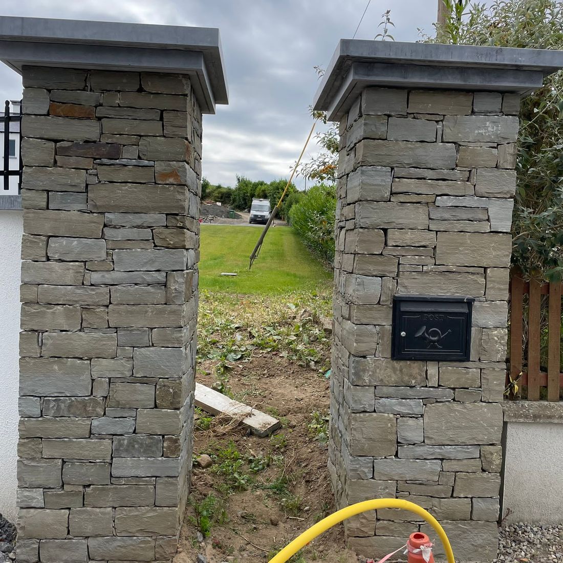 Grey sandstone piers with various natural colours & shades