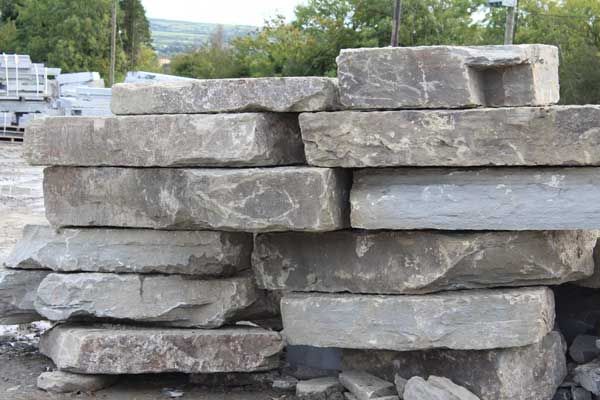 Large flat grey sandstone rock armour