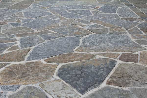 Random grey & brown sandstone paving