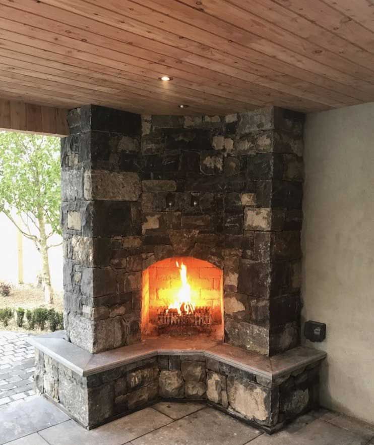 Kilkenny blue limestone with hand dressed corners complimented with white natural corner stones