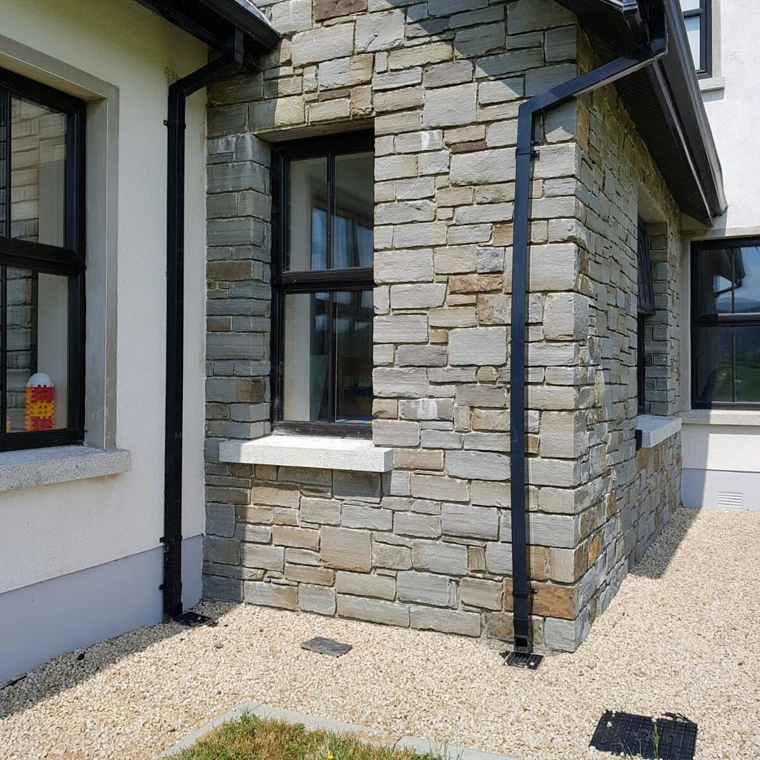 Grey sandstone with dressed corners and shades & tones