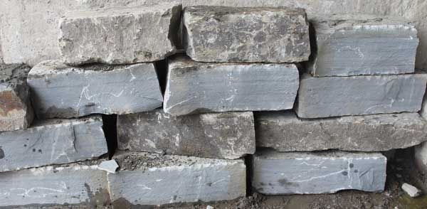 Oversized split grey sandstone rock armour