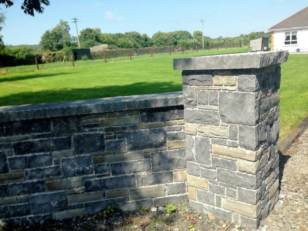 Limestone dressed corner stones blended with grey sandstone